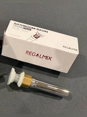 Regalmix bathroom basin drain featuring a pop-up stopper and built-in strainer
